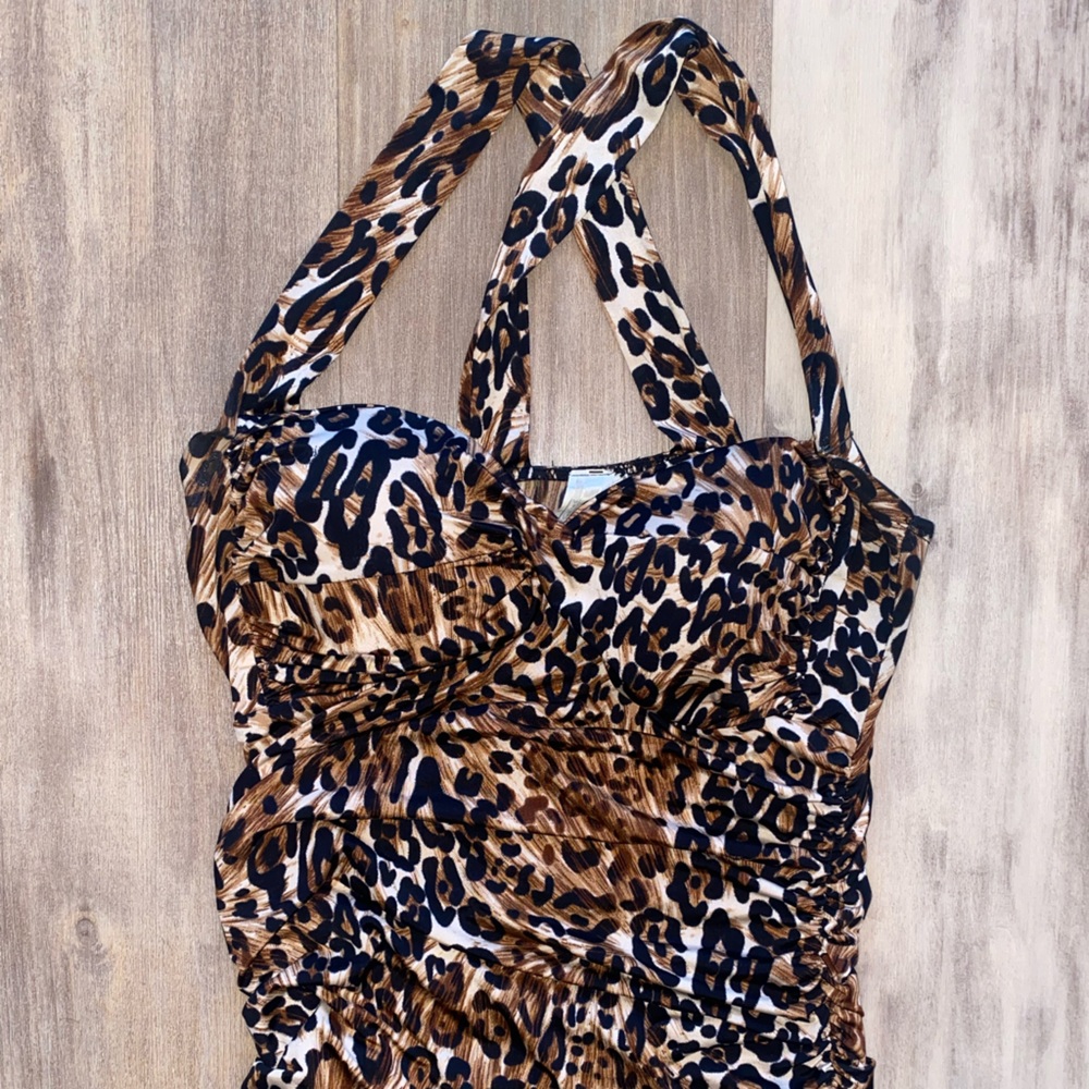 NEVER WORN Cheetah print cross back top shirt in medium